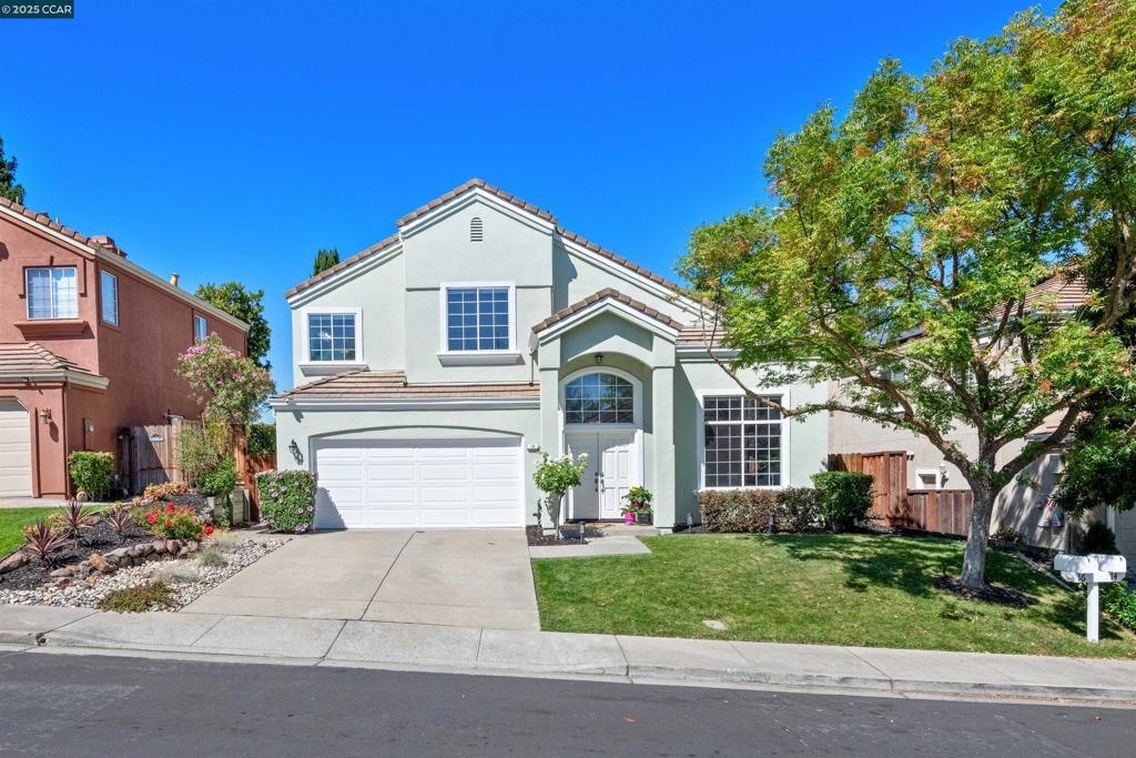 Charming East-Facing Home in Prime Danville Location Step into this beautifully updated 4-bedroom, 3-bathroom home, ideally situated near top-rated elementary and middle schools in the heart of Danville. With a full bedroom and bathroom conveniently located on the main level, this home offers flexibility for guests, multi-generational living, or a private office space. The inviting stucco exterior and classic tile roof set the tone for timeless curb appeal. Inside, you'll find fresh designer paint throughout, newer luxury vinyl tile flooring, and bright new LED lighting that enhance the home's modern feel. The spacious white kitchen features tile granite countertops, a breakfast bar, tile back splash and garden window for tons of light and flows seamlessly to the breakfast nook and family room—perfect for entertaining. Enjoy cozy evenings by the newly updated fireplace or relax in the private backyard oasis. The home also boasts double front doors, updated bathrooms, large garage with epoxy floors, lots of storage, vaulted ceilings in two bedrooms and living room to add to the open feel. Large kid friendly community pool and club house perfect for hosting summer events. Don’t miss this opportunity to own a move-in-ready home in one of Danville’s most desirable neighborhoods!