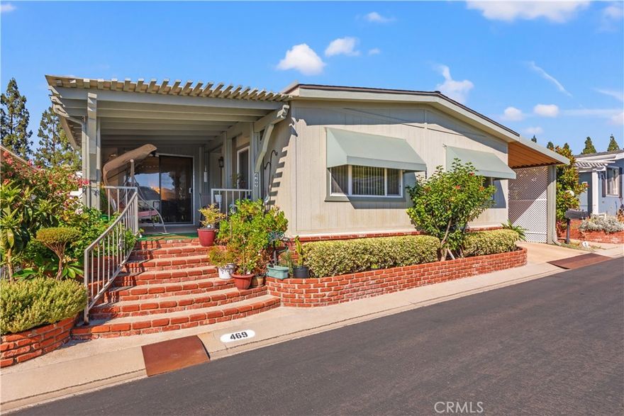 Welcome to “The Groves” — Irvine’s Hidden Gem for Active 55+ Living! Nestled within a gated community with a 24/7 attendant, The Groves offers an unparalleled lifestyle for those seeking comfort, connection, and peace of mind. Unlike many other communities, there’s no space rent here—just true land ownership. This beautifully maintained, semi-updated 2-bedroom, 2-bath home is one of the few homes that features both a front and back porch, perfect for those who love to enjoy Irvine’s year-round sunshine. The home boasts LVP flooring throughout and dual-pane windows that add to its comfort and charm. A spaciously designed kitchen has granite countertops, oak cabinets and black appliances. The oversized primary suite is a true retreat, featuring a large walk-in closet and a second, full-length closet. The second bedroom offers direct access to the guest bathroom, which connects seamlessly to a large laundry room complete with extra cabinetry and a built-in desk. But what truly sets The Groves apart is its remarkable sense of community and wide array of amenities designed to support an active, fulfilling lifestyle. From spontaneous morning walks to planned social gatherings, the community spirit here is genuine, welcoming, and alive. Amenities include:A recently renovated year-round heated pool & spa, gym, sauna, Pickleball, tennis, and basketball courts, putting green, lawn bowling, a beautiful clubhouse with banquet facilities and lounge areas, game rooms featuring Ping Pong, Billiards, and Poker tables, a ceramic studio and fully-equipped woodshop for creative pursuits. There are also a community garden, an on-site hair salon and community BBQ areas with outdoor seating. Additionally there is RV parking, a dedicated car wash area, and so much more. A full-time on-site management team and activities coordinator ensure a robust community calendar packed with clubs, themed events, volunteer opportunities, and group outings. Whether you're looking to stay fit, explore hobbies, meet new friends, or simply enjoy a vibrant social life, The Groves makes it easy. Low monthly maintenance fees and discounted Cox TV and Internet services make living here as practical as it is pleasurable. Come experience what residents lovingly call the “Bubble within the Bubble”—a quiet, friendly oasis where life moves at just the right pace and neighbors become lifelong friends. Don’t miss this opportunity to make The Groves your new home. Comfort, safety, community, and joy await!
