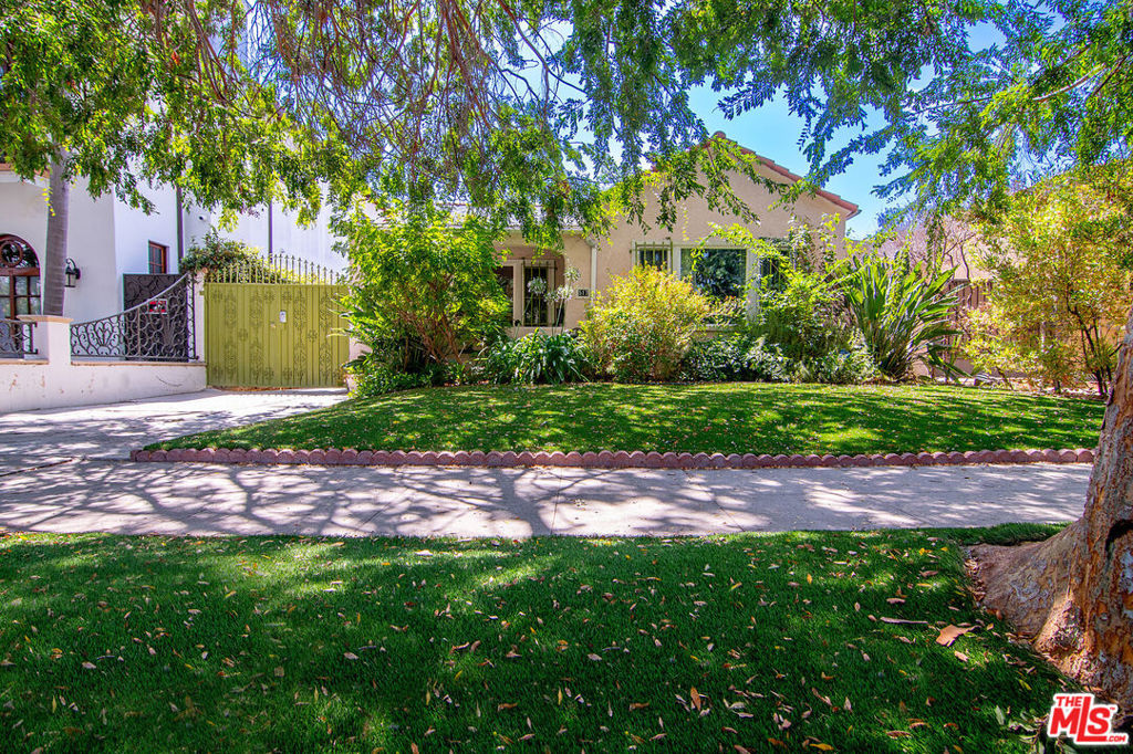 5 bedroom 3 bathroom furnished home for lease in prime Miracle Mile location. Green front lawn with mature landscaping and gate at driveway for security. Living room with fireplace and built-in bookcases opens to the dining room and kitchen. Kitchen has double sinks, stainless steel appliances, generous counter and storage space. 5 beds and 3 baths. Washer/dryer in designated laundry room. Backyard features a pergola with bbq, hardscape and landscape, hedges and trees for privacy. Hardwood floors, central HVAC. Amazing location close to The Grove, Pan Pacific Park, Erewhon, local restaurants! Available immediately!