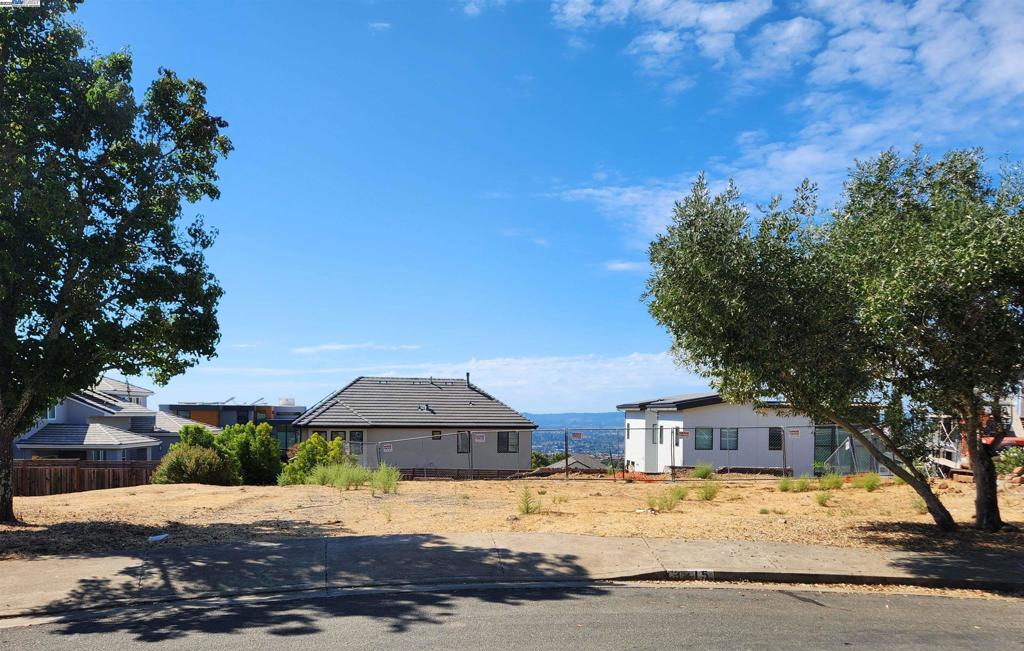 Discover the allure of one of the area's most sought-after locations. This exquisite 8,000+ sq ft lot is perfectly situated on a tranquil cul-de-sac, offering stunning city views and enhanced privacy with Rincon Ridge Park and Parker Hill Open Space as your backdrop. Imagine building your dream home: a 3,590 sq ft architectural masterpiece featuring 4 bedrooms, 4 bathrooms, and a 2-car garage. Some retaining walls and structures from the original build may still be usable, providing a head start on your luxurious rebuild. With its proximity to The Fountaingrove Golf and Athletic Club, this lot is your chance to create a prestigious home in an unbeatable setting.