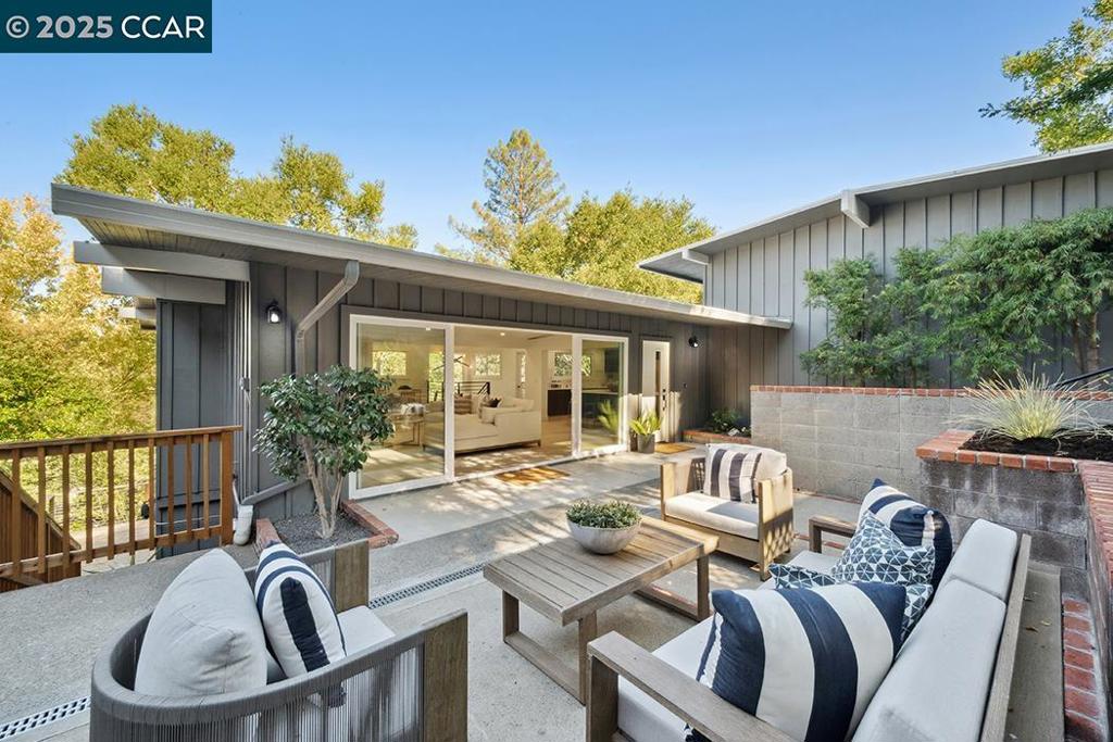 Welcome to 26 Berkeley Avenue, a thoughtfully renovated 4-bedroom, 3-bathroom home offering 2,261 square feet of move-in ready living space, plus an additional 200 square feet of storage. This freshly reimagined home features an open-concept floor plan that maximizes natural light and creates an inviting treehouse feel among the oak-studded Orinda hills. The newly installed back deck provides a pleasant spot for outdoor dining and relaxation, with easy access from the main living areas. The remodeled kitchen anchors the home's open layout, featuring a new island that resulted from removing walls to improve flow between spaces. Updates include new countertops, cabinetry with soft-close drawers, and Bosch appliances, everything you need for comfortable daily living and entertaining friends and family. Recent improvements throughout include new roof and lighting fixtures, fresh flooring throughout, and three remodeled bathrooms with new tiles and vanities. Vaulted ceilings enhance the sense of space while large windows frame views of the surrounding oaks. Located in Orinda's peaceful hills, this turnkey home offers convenient access to daily amenities and award-winning Orinda schools and a nearby bus stop for Orinda Intermediate Schools.