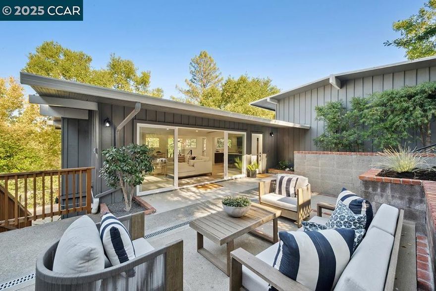 Welcome to 26 Berkeley Avenue, a thoughtfully renovated 4-bedroom, 3-bathroom home offering 2,261 square feet of move-in ready living space, plus an additional 200 square feet of storage.   This freshly reimagined home features an open-concept floor plan that maximizes natural light and creates an inviting treehouse feel among the oak-studded Orinda hills. The newly installed back deck provides a pleasant spot for outdoor dining and relaxation, with easy access from the main living areas.    The remodeled kitchen anchors the home's open layout, featuring a new island that resulted from removing walls to improve flow between spaces. Updates include new countertops, cabinetry with soft-close drawers, and Bosch appliances, everything you need for comfortable daily living and entertaining friends and family.   Recent improvements throughout include new roof and lighting fixtures, fresh flooring throughout, and three remodeled bathrooms with new tiles and vanities. Vaulted ceilings enhance the sense of space while large windows frame views of the surrounding oaks.   Located in Orinda's peaceful hills, this turnkey home offers convenient access to daily amenities and award-winning Orinda schools and a nearby bus stop for Orinda Intermediate Schools.