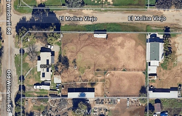 30750 Old Windmill rd features a 1,440 sq ft 3 bedroom 2 bathroom 433A certified Manufactured Home on a permanent foundation built in 1984 on just over 1 acre located in the "Community Core" of Menifee's Economic Development Corridor. This large lot has development potential & the neighboring properties 27321 La Piedra rd, 30525 Old Windmill rd, 30550 stern dr, 30581 Old Windmill rd, 30620 Old Windmill rd, 30640 Old Windmill rd & 30645 Old Windmill rd are listed for sale as well.