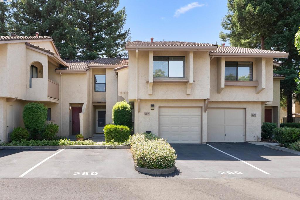 Welcome to this charming 3-bedroom, 2.5-bath townhouse—perfect for first-time buyers or those looking to downsize. A clean slate with fresh painting and brand new carpeting, it is ready to be truly made into your image. This home offers incredible potential with a functional layout and rare features you won’t often find in this style of property. Enjoy a private backyard for entertaining, a dedicated laundry room, and a cozy fireplace in the family room. The kitchen offers bar seating along with a separate dining area just off of it, and there’s a convenient half bath downstairs for guests. Plus, a pantry with its own cooling for storage. Upstairs, the oversized primary suite features a private balcony and plenty of space to unwind, You will also find 2 additional bedrooms with their own shared bathroom. With two A/C units, comfort is a given year-round. Parking is easy with a one-car garage plus two additional deeded spots! The HOA provides a wonderful community pool and general landscaping. Walking distance to top-rated, fantastic Livermore schools and with low-maintenance living, this home is ideal for both growing families and travelers alike.