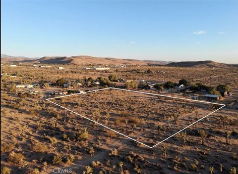 Photo of 0 Old Haggard Road, Yucca Valley, CA 92284 (MLS # JT25134167) Photo of 0 Old Haggard Road, Yucca Valley, CA 92284 (MLS # JT25134167)