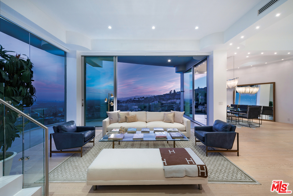 Unobstructed City to Ocean Views! Custom Architectural on lower Sunset Strip with explosive 300 degree city, mountain and ocean views. Private, end of cul-de-sac, point lot. The execution of refined design aesthetic, features nearly 6000sf of gorgeous indoor-outdoor entertainment spaces. Poliform-Miele kitchen, an impressive 3-story cascading staircase, floor-to-ceiling windows and doors with staggering ceiling heights not replicatable today. Guest bedroom top level with two private suites, outdoor deck and fully appointed designer baths. Exquisite master bedroom level is poolside with a stunning marble spa bath, ocean view tub & shower + mega walk-in closet. Two car garage + one car off-street, onsite parking. Bonus undeveloped space. Only a few minutes to Sunset Boulevard. Also For Lease, Please Call For Details.