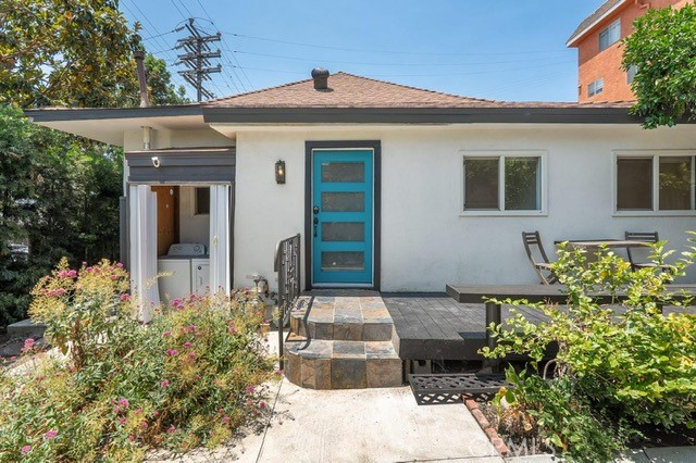 Step into this updated turnkey home where modern style meets cozy comfort. The easy-flow floor plan begins with a welcoming living room enhanced by sleek lighting, while the efficient kitchen boasts modern appliances and chic finishes. Two bright bedrooms with oversized windows invite abundant natural light, complemented by a contemporary bathroom and convenient laundry space. Outside, the private enclosed yard offers a serene escape with breathtaking views of the Los Angeles skyline. Surrounded by lush greenery yet minutes from Chinatown, Japantown, Atwater Village, Silver Lake, Echo Park, and the vibrant Highland Park scene, this home perfectly balances convenience and tranquility—ideal for both entertaining and unwinding.