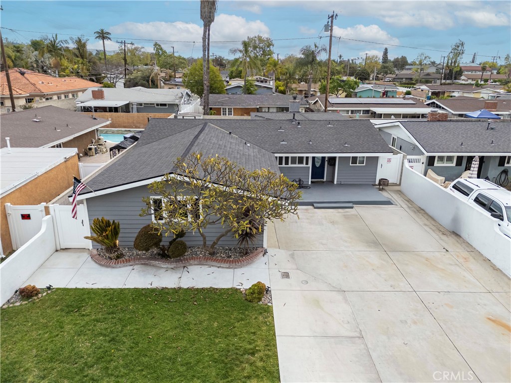 Welcome to 10930 Groveland Ave! This beautifully upgraded five-bedroom, two-bathroom residence offers the perfect balance of comfort, space, and modern living in the highly desirable community of East Whittier. From the moment you arrive, you’ll appreciate the thoughtful upgrades that set this property apart. The home features all-new dual-pane windows, filling each room with natural light while keeping the interior quiet and energy-efficient. A POWERFUL 4-TON HVAC system ensures year-round comfort for the entire household. Step inside to an open-concept kitchen, fully remodeled just a few years ago with both style and functionality in mind. Perfect for entertaining and everyday living, the kitchen flows seamlessly into the dining and living areas. At the heart of the home lies a massive family room an expansive space perfect for movie nights, celebrations, or simply relaxing. With five spacious bedrooms, there’s room for everyone to enjoy their own private retreat. The property also boasts a private laundry room, a roomy two-car attached garage, and a rare find in this area a huge six-car driveway with RV parking. Whether you have multiple vehicles, recreational toys, or simply value extra parking space, this feature adds incredible convenience and versatility.Outside, a generously sized backyard offers endless possibilities for entertaining, gardening, or creating your own outdoor oasis. Situated in one of East Whittier’s most sought-after neighborhoods, this home belongs to some of the area’s top-rated schools and is centrally located near shopping, dining, and all the everyday conveniences you need.