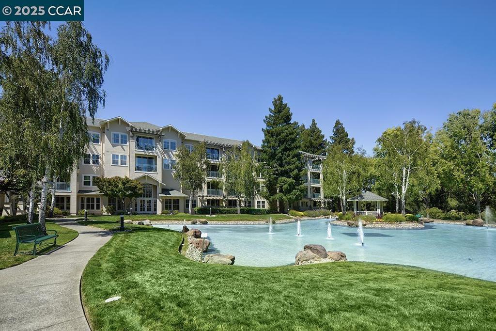 Spacious and charming, this rare double-unit in the Waterford’s Northwest Building offers the best of congregate living in sought-after Rossmoor’s 55+ gated community. Thoughtfully remodeled, it features a beautiful kitchen, a dedicated laundry room with full-size side-by-side washer/dryer, and a generous walk-in closet. As a unique “conversion” of two condos, this home includes two parking spaces, two storage rooms, and two daily meals. Enjoy resort-style amenities including 24/7 front desk support, organized activities, weekly light housekeeping, a lively common dining room hosting concerts, dances and a full calendar of social activities. Ideally located near the Tice Creek Fitness Center, dog park, and Gateway community center that has a movie theater, game room for Bridge etc, hobby rooms, library and more. The Waterford has lovely areas to take walks and enjoy the pond with fountain and charming patios. Waterford maintains the buildings and Dues cover buildings as well as water/hot water/sewer/trash removal/meals. Parking are covered carports 62 & 71.