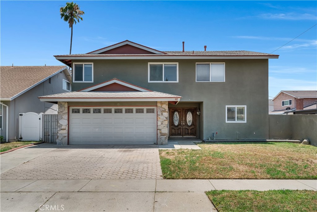 Located in a friendly, established Carson neighborhood, this spacious two-story home offers plenty of room to grow. With five bedrooms, three bathrooms, and over 2,600 square feet of living space, it features hardwood floors in the living, dining, and entry areas; perfect for gatherings or relaxing nights in. The home sits on a 5,200 square foot lot and includes a flexible layout. The family room has been used as a fourth bedroom, giving you options for extended family or guests. Central heating, air conditioning, and a cozy fireplace add to the everyday comfort. Living here means easy access to local schools, parks, and shopping. Broadacres Elementary, Glenn Hammond Curtiss Middle, and Cal State Dominguez Hills are just minutes away. You’re also close to community centers, dining, and major freeways, making it simple to reach Long Beach, LAX, or downtown Los Angeles. This is a great opportunity to settle into a well-connected, welcoming neighborhood in the heart of Carson.