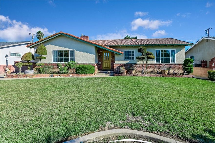 Welcome home to this highly coveted SINGLE-STORY gem in the heart of West Covina. 

Freshly painted INSIDE, this home offers a light, bright, and inviting atmosphere with true PRIDE OF OWNERSHIP throughout. The interior features GORGEOUS REFINISHED LIGHT, NATURAL-TONED HARDWOOD FLOORING, DUAL-PANE WINDOWS, RECESSED LIGHTING, and a thoughtfully designed floor plan ideal for everyday living.

The inviting living space is anchored by a CHARMING DOUBLE-SIDED FIREPLACE connecting the living and family rooms—perfect for cozy evenings or effortless entertaining. The kitchen showcases THOMASVILLE CABINETRY with ample storage and functionality.

Step outside to a beautifully maintained yard with MATURE LANDSCAPING, including a FRUIT-BEARING CITRUS TREE, and a LARGE COVERED PATIO ideal for morning coffee, weekend gatherings, or quiet evenings outdoors. The generously sized lot offers plenty of room to ENTERTAIN, GARDEN, OR EXPAND.

Additional highlights include an INDIVIDUAL LAUNDRY ROOM WITH DIRECT BACKYARD ACCESS, a DETACHED 2-CAR GARAGE, a LONG DRIVEWAY FOR ADDITIONAL PARKING, EXCELLENT CURB APPEAL, and the ease of SINGLE-LEVEL LIVING. Located in an established West Covina neighborhood near TOP-RATED SCHOOLS, LOCAL PARKS, SHOPPING CENTERS, and COMMUTER ROUTES, this home offers so much in a highly desirable area—a place where comfort and everyday living come together.