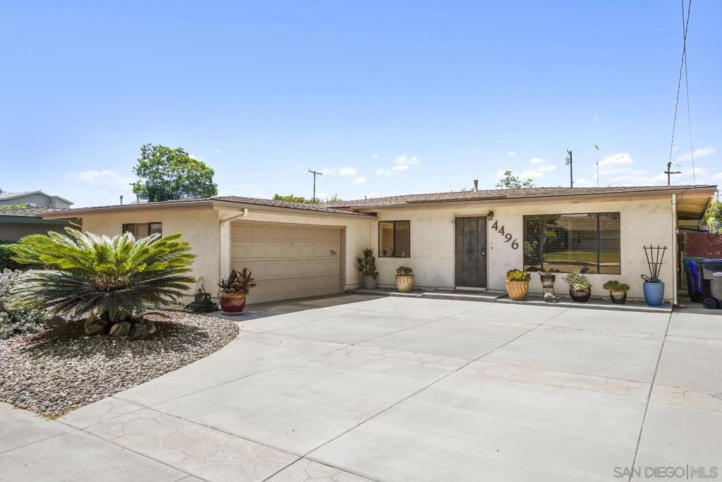 Welcome to this charming starter home ideally located in a desirable, sought-after Clairemont neighborhood just a short walk to all the conveniences of Clairemont Square. This inviting residence features central air conditioning, stainless steel kitchen appliances including refrigerator. Skylight in kitchen. Washer and dryer included. Enjoy outdoor living with a covered Alumawood patio and a low-maintenance turf backyard—perfect for entertaining or relaxing. Inside, you'll find plantation shutters, ceiling fans in every bedroom, and mirrored closet doors. The home also boasts a spacious side yard and an extra-large driveway, offering parking for 4 to 5 vehicles plus a 2 car garage A fantastic opportunity for first-time buyers or anyone looking for comfort, convenience, and curb appeal.