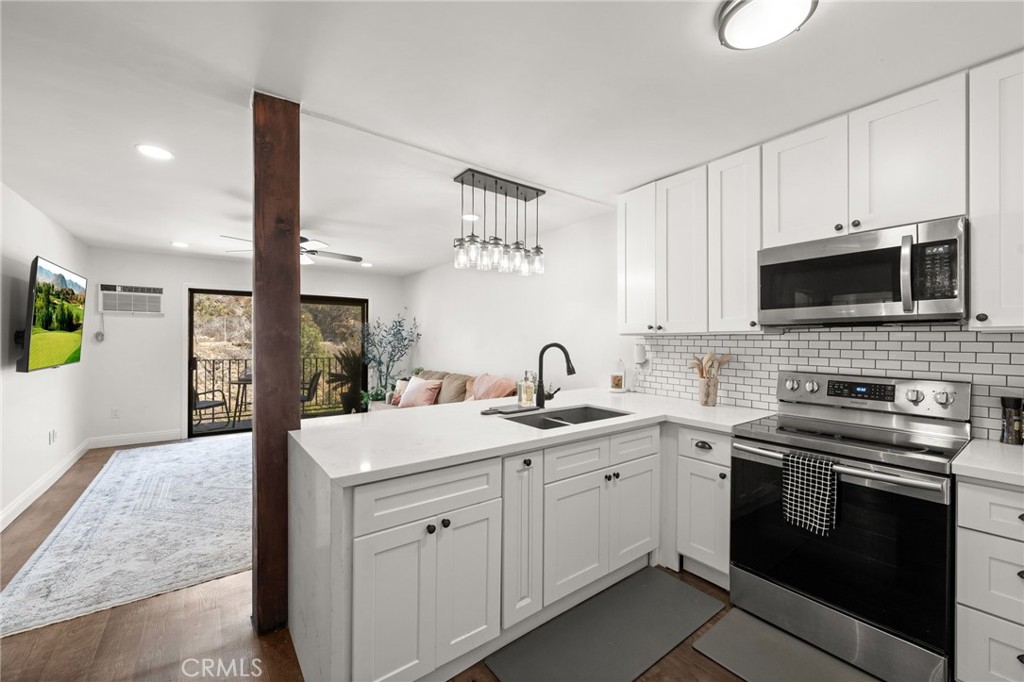 Welcome to this stunning 2-bedroom, 1-bath condo in the heart of Mission Valley—completely remodeled with high-end finishes and attention to every detail! This rare gem includes parking for two and a private balcony, perfect for relaxing and enjoying the outdoors. Inside, you'll love the modern upgrades, including a waterfall quartz countertop, new flooring, and sleek cabinetry throughout. Ideally located at the back of the complex, this unit offers extra privacy and a peaceful atmosphere, just minutes from USC, SDSU, Fashion Valley Mall, trolley stops, and major freeways—plus easy access to beaches and golf courses. Resort-style amenities include: sparkling pool, spa/hot tub, and sauna, BBQ and picnic areas, gym/weight room, multiple community laundry rooms, a lush central atrium, and several elevators for your convenience. HOA that covers Spectrum Internet/TV, water, hot water, trash, and insurance—making this a truly worry-free home