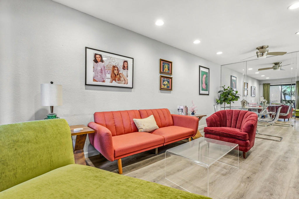 Welcome to this beautifully updated condo in Palm Springs Villas II, offering a fresh modern design and resort-style living. This stylish 1-bedroom, 1-bath condo just steps away from the pool features an open living and dining area with wood-look flooring, recessed lighting, mirrored closet doors, and a covered patio surrounded by lush greenery with a North-facing view of the tennis courts. The kitchen boasts quartz counters, sleek white cabinetry, and stainless-steel appliances. The spacious bedroom includes ample natural light and mirrored wardrobes, while the bathroom showcases a walk-in shower with stone accents and a glass enclosure. Palm Springs Villas II offers tennis courts, sparkling pools and spas, and beautifully landscaped grounds--all just minutes from downtown Palm Springs, dining, and shopping.