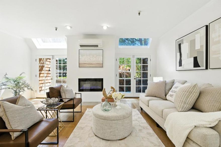 This rarely available home places you steps from everything downtown Palo Alto has to offer, including Whole Foods, parks, American Heritage Museum, renowned restaurants, Stanford University, biking trails, and Caltrain. This beautifully appointed 3-bedroom, 2.5-bath home boasts the best location in the community, featuring a private patio perfect for entertaining or unwinding after a day in town. Inside, you'll find 1,580 square feet of light-filled living space, featuring soaring ceilings, oversized skylights, and two sets of French doors that open onto a serene, landscaped courtyard. The home is thoughtfully designed with custom closet systems, durable flooring, split-unit A/C & heat, and elegant upgrades throughout, quartz countertops in the kitchen and baths, fresh paint, a wine fridge, and a sleek modern fireplace. With top-rated Palo Alto schools, ample guest parking, and a walk-to-everything lifestyle, this turnkey home offers unbeatable value in an unbeatable location.