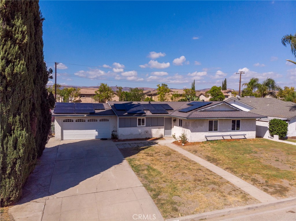 Welcome to your next home in beautiful West Simi Valley! This 3-bedroom, 2-bath single-family residence is nestled in a desirable neighborhood and sits on a generous lot with unlimited possibilities—whether you dream of a sparkling pool, an ADU, or the ultimate outdoor entertaining space. Inside, enjoy a remodeled kitchen, dual-pane windows, fresh interior paint, and the peace of mind of a newer roof, newer HVAC system, and financed solar with battery backup. Perfectly located near the 118 and 23 freeways, shopping, dining, and schools, this home blends convenience with potential. Move right in and start imagining the possibilities!