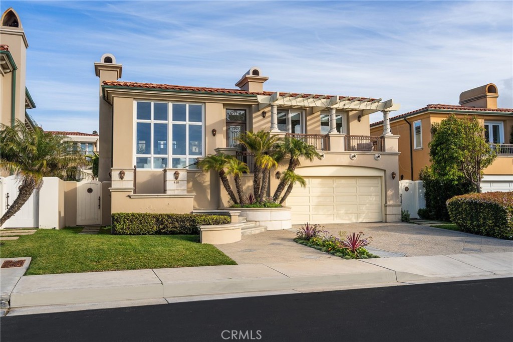 Welcome to 410 Paseo De La Concha, a stunning coastal retreat in the exclusive Riviera Beach Colony, in fact I can only think of one other gated home community in Los Angeles county! Nestled in the highly sought-after Hollywood Riviera neighborhood, this 5-bedroom, 4.5-bathroom home offers 3,294 sq. ft. of thoughtfully designed living space on a 6,009 sq. ft. lot. Boasting a prime location just steps from the Redondo Beach Esplanade, you'll enjoy the ultimate SoCal lifestyle with the beach, local shops, and vibrant dining options of the Hollywood Riviera all within walking distance. The home's exceptional floor plan places the primary suite, kitchen, and family room all on one level, ensuring effortless flow for everyday living. Large west-facing windows fill the home with natural light and capture breathtaking ocean views with a unique and special sunset display 365 days a year. Whether you're hosting gatherings in the spacious living areas or taking in serene sunsets from your private vantage point, 410 Paseo De La Concha embodies coastal living at its finest. Experience the charm, luxury, and convenience of this rare gem in Redondo Beach's most coveted gated community. Don't miss this opportunity to make it yours.