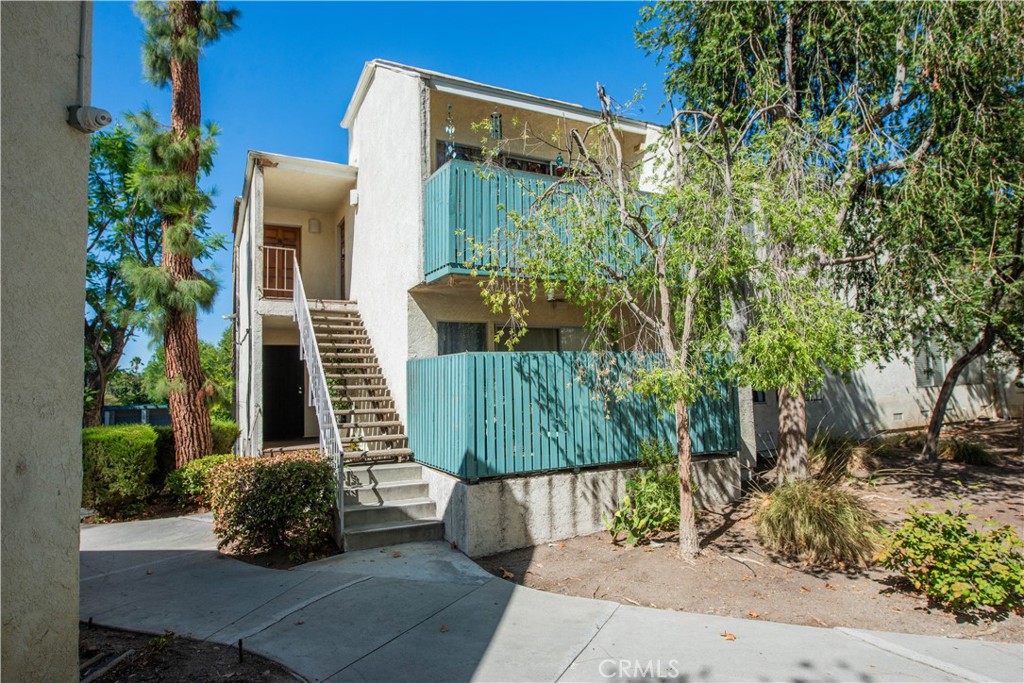 Spacious Upper-Level Condo with Natural Light and Investment Potential. Welcome to this bright and airy upper-level condo featuring 2 generously sized bedrooms, 1 bathroom, a spacious living room, dining area, and a large walk-in closet. The open layout is filled with natural light thanks to expansive dormer windows and a large sliding glass door that opens to a private balcony overlooking a tranquil courtyard with mature trees. This unit is perfect as a primary residence or a smart investment opportunity. Currently rented offering solid income potential without the restrictions of rent control. Enjoy resort-style community amenities including peaceful walking paths, a pool, spa, and recreation room. Additional features include two side-by-side parking spaces and secure, controlled access to the building. Don't miss your chance to own a well-located, income-producing property in a beautifully maintained complex!
