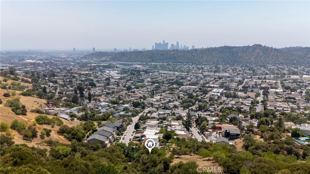 Discover an exceptional opportunity to design your hillside sanctuary in one of Northeast Los Angeles’s most desirable neighborhoods. This 3,946 sq ft LARE20 zoned lot features expansive city-light and hill views, situated on a paper street that allows for customized driveway and entryway planning. Located just minutes from DTLA, Dodger Stadium, Glendale, Pasadena, and vibrant areas like Highland Park and Eagle Rock, the property offers a balance of privacy and accessibility. Buyers have the option to design and construct their own private access route from Altamont Street to the lot, enabling a tailored approach to this well-positioned site.