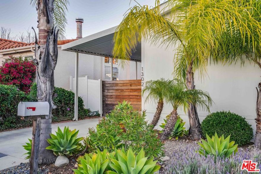 Breathtaking airline views, and access to both the ocean and the valley, all for under $1M. Built in 2015, this rare view home offers a warm, modern aesthetic and an open layout designed for light-filled living. Floor-to-ceiling windows frame stunning vistas of mountains and sparkling city lights, while doors lead to an expansive deck perfect for outdoor gatherings.  The kitchen features sleek stainless appliances, a convenient central island, and abundant storage, making it a cook's delight. A soft neutral interior palette, stylish lighting, central air and heat, laundry/coat room enhance the home's comfort and functionality.  Located in a private gated dog-friendly community with incredible amenities including a pool, spa, gym, clubhouse, and on-site management, you'll enjoy an effortless lifestyle. Set on a quiet street, this home is close to favorite hiking trails, cute cafes & restaurants, shopping and schools.  Community has recently spent $12M + dollars in upgrades. Where else can you find this kind of value and versatility?