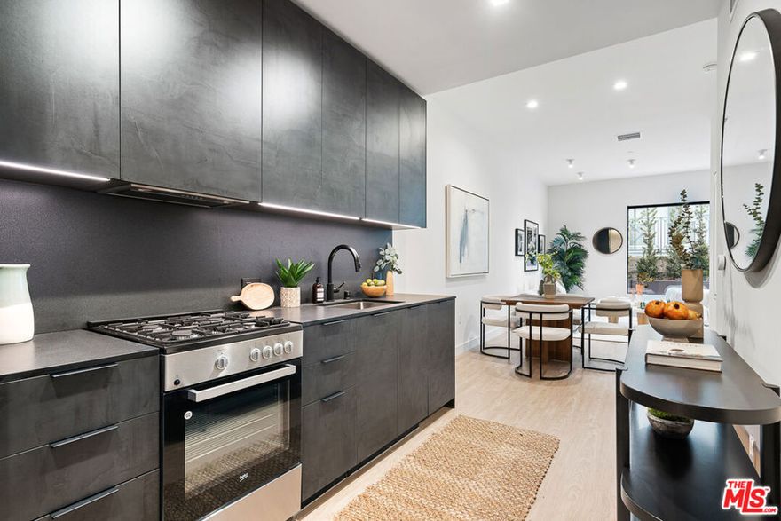 Venue Residences by Helio. This beautiful 1 bed + 1 bath is located on the 3rd floor. Kitchen has unique dark finishes with stained granite counters, matte black fixtures, and stainless steel Beko appliances. The open living and dining concept allow for a good flow of the space, as well as access to a large balcony for comfortable outdoor lounging. The bedroom has dual access to the balcony, built in ambient lighting and a remote controlled ceiling fan. In the bathroom is a wall-to-wall mirror, shower/tub, and under cabinet storage. Residence also includes walk-in closet, electronic window shades, and Nest thermostat. Property amenities include 2 rooftops, heated dipping pool, outdoor cooking area, co-working lounges, large fitness center with Technogym equipment and front desk staff. Parking is $150/month for a single parking space, and internet $84/month. Photos are not of exact unit. Contact us today!