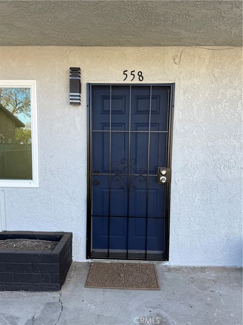 Photo of 558 S Benjamin St, Rialto, CA 92376 (MLS # IG26018470)