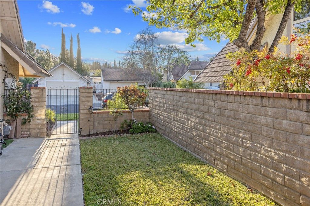 Photo of 27104 Rio Prado Drive, Valencia, CA 91354 (MLS # SR26057932)