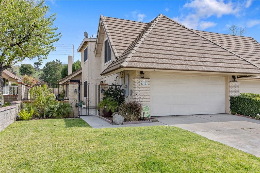 Photo of 27104 Rio Prado Drive, Valencia, CA 91354 (MLS # SR26057932)