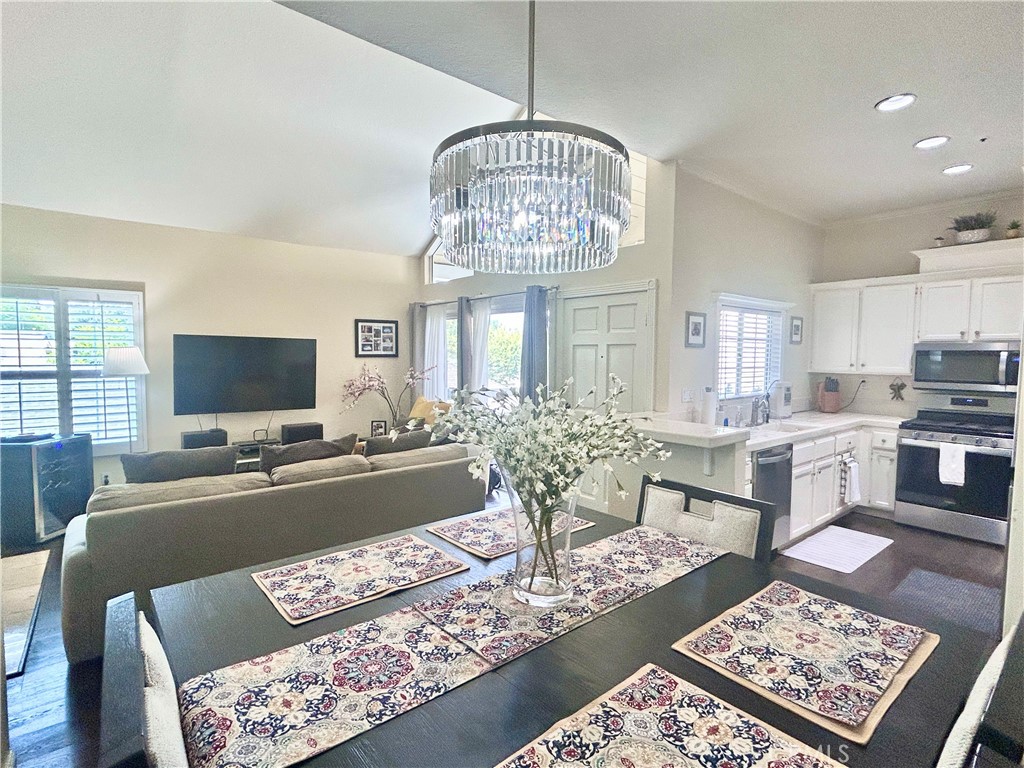 Tucked inside a beautifully maintained community, this upper-level condo offers the perfect mix of privacy, style, and convenience just minutes from South Coast Plaza. Private stairs lead you to your own entry balcony, setting the stage for a home that feels both welcoming and set apart. From the moment you step inside, vaulted ceilings, natural light, and a spacious open design create a warm, inviting atmosphere. The first floor of the building is dedicated to your private garage, giving this 2nd-floor unit extra peace and privacy. The living room, anchored by a striking tiled fireplace, is the heart of the home, a space that feels grand yet comfortable. Just to the left, the dining area flows seamlessly for easy entertaining and everyday meals. A versatile den, currently set up as an office, gives you options to create the space you need, whether that’s a dedicated workspace, reading nook, or guest retreat. The bedroom is bright and comfortable, with blackout blinds and a full wall of mirrored closets for ample storage. The bathroom offers thoughtful functionality with a full bath and a separate sink/dressing area that provides added privacy. In-unit full-size washer and dryer add rare convenience and fairly new appliances. Step outside to your private balcony and enjoy fresh breezes, a morning coffee, or an evening glass of wine. Beyond your door, world-class shopping, dining, and entertainment at South Coast Plaza are just a short walk away, with parks, cafes, and conveniences all around. This isn’t just a condo, it’s a lifestyle. Modern, comfortable, and move-in ready, with every detail designed to make daily living effortless. Don’t miss your chance to own a home that truly stands out.