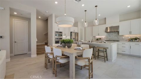 Photo of 27325 Shore Pine Place, Valencia, CA 91381 (MLS # OC25278004)