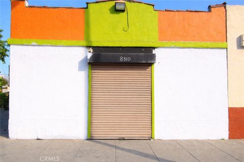 Photo of 8310 S Broadway, Los Angeles, CA 90003 (MLS # DW26031978)