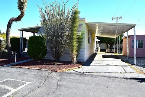 Photo of 56425 29 Palms Highway #100, Yucca Valley, CA 92284 (MLS # JT25248409)