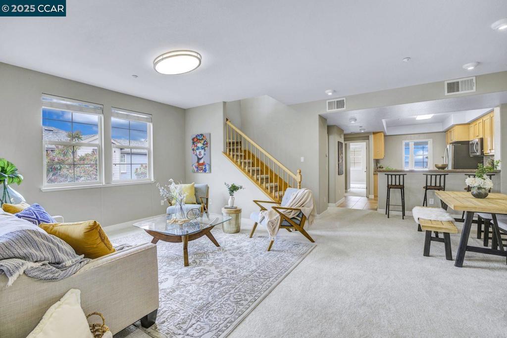Imagine waking up to stunning Oakland Hills views every day. This peaceful, roomy townhome-style condo at 6130 Old Quarry Loop delivers. You'll love the two large primary suites, a bonus room perfect for an office or third bedroom, and three full bathrooms. The kitchen is ready for entertaining with stainless steel appliances, granite counters, and a handy breakfast bar. In-unit laundry and a private two-car garage make life easy. Commuting is a breeze from this spot right off Highway 580, putting you close to OAK, the Oakland Zoo, Lake Merritt, and all the action downtown.