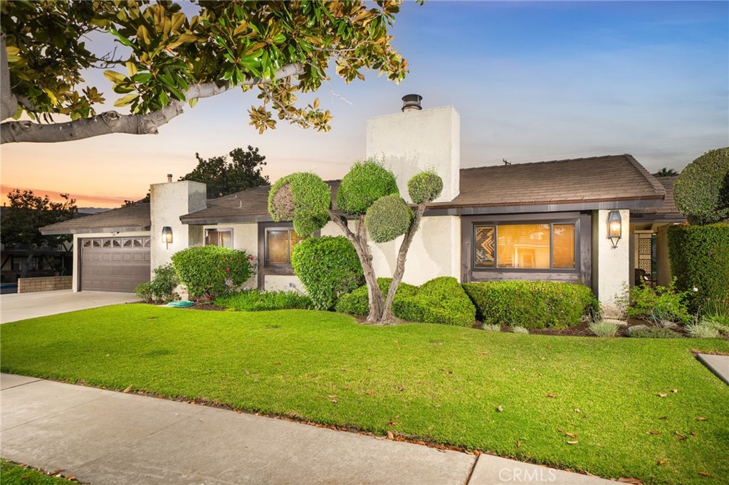 Beautifully remodeled and updated Single Story End Unit two bedroom, two bathroom condominium located in small community walking distance to downtown Glendora Village. Enjoy the local restaurants, shopping, local parks, and numerous community events thru-out the year in the Village. This charming condo features a gated quaint courtyard and front porch, formal living room with high ceilings and gas fireplace, open kitchen with updated cabinets, granite counters, stainless appliances, center island, and direct access to attached garage. Primary suite with mirrored closet doors and slider door to private backyard, primary bathroom with updated vanity with granite counters, and bathtub/shower. Second bedroom with spacious closet, hallway bathroom with shower and updated vanity with granite counter. Inside laundry in hallway with storage. Upgrades include: tile floors thru-out, dual pane windows, tankless water heater, copper plumbing, updated bathrooms, updated kitchen, and recessed lighting. Two car attached garage with epoxy flooring and storage and full driveway with additional side parking space. Private backyard with block wall and turf lawn. Located in the Glendora Unified School District. You won't want to miss this one!