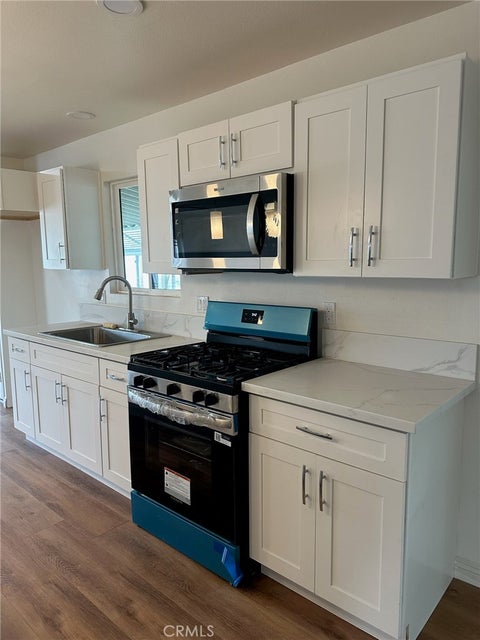 Photo of 8509 Beverly Boulevard #24, Pico Rivera, CA 90660 (MLS # DW26230650)