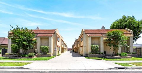 Photo of 9914 Tweedy Lane #C, Downey, CA 90240 (MLS # TR26092956)
