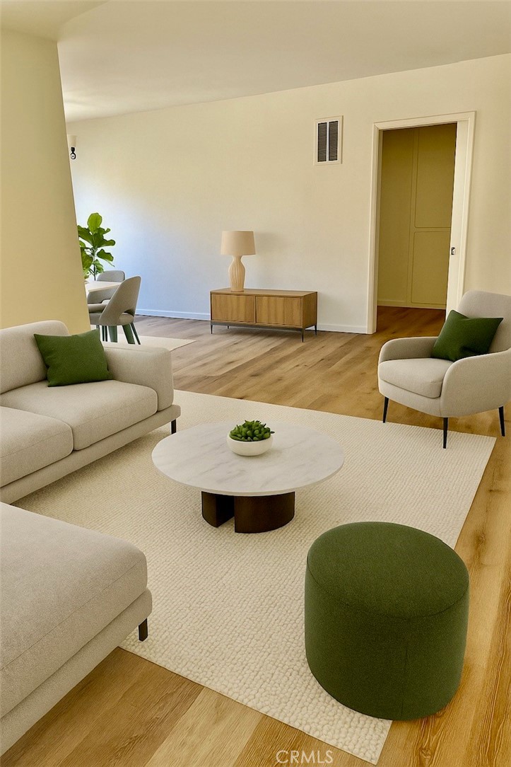 Prime 2-Bedroom, 1-Bath Apartment Near Koreatown.
Discover this beautifully maintained 2-bedroom, 1-bath downstairs apartment, ideally located just minutes from Koreatown. Nestled behind secure gates in a well-kept building, this spacious unit offers a bright, open-concept floor plan with a large living room and a dedicated dining area, perfect for entertaining, especially during the holidays. The sunlit kitchen is both functional and inviting, featuring a refrigerator, a brand new stove, and ample cabinetry for all your culinary needs. There’s even enough space for a breakfast nook, where you can relax with your morning coffee while enjoying the view.
The generously sized bedrooms will comfortably fit a king-size bed and both bedrooms include excellent closet space. Additional storage includes a large hallway linen closet and a huge coat closet in the living room. The bathroom features a clean, modern aesthetic with a shower/tub combination and sleek vanity.
Enjoy peace and privacy in this charming lower-level unit. Additional amenities include one parking space with overhead storage and convenient on-site laundry facilities. With easy access to major freeways and public transportation, you're just minutes from Koreatown, Larchmont Village, Hollywood, and Downtown LA. Live close to the best of Los Angeles restaurants, shopping, and vibrant culture, all right at your doorstep. Welcome Home.