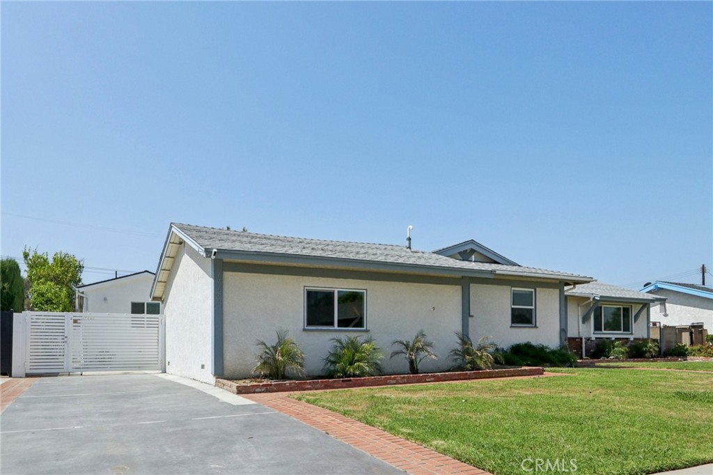 Northridge Stunner with a Brand New ADU! Welcome to this beautifully updated home located in one of Northridge’s most desirable neighborhoods. Sitting on an expansive 11,000 sqft lot, this property features a brand-new detached ADU and high-end finishes throughout. The main home at 17148 Stare St offers 2,209 sqft of living space, featuring 5 spacious bedrooms and 2.5 bathrooms. Remodeled in 2020, it boasts fresh paint, recessed lighting, a large living room with a cozy fireplace, and a gourmet chef’s kitchen equipped with stainless steel appliances, white shaker cabinets, a farmhouse sink, and a massive granite island with seating. The home also includes a newer roof and windows. Step outside to a spacious covered patio surrounded by mature fruit trees - orange, pear, lemon, and grapefruit. The brand-new 1,200 sqft detached ADU at 17146 Stare St is a true showstopper! It features 2 bedrooms, 2 bathrooms, soaring 10-foot ceilings, and a designer kitchen with white shaker cabinets, gold hardware, stainless steel appliances, and a large center island. Best of all, it comes with paid-off solar! Whether you're searching for your dream home, space for extended family, or a high-potential investment property, this Northridge gem has it all. Conveniently located near CSUN, freeways, shopping, and dining. This is a rare opportunity you don’t want to miss!
