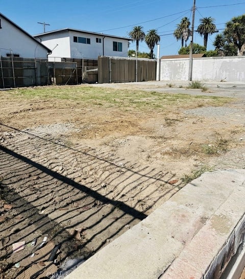 Photo of 1021 W Florence Avenue, Los Angeles, CA 90044 (MLS # SB26221071)