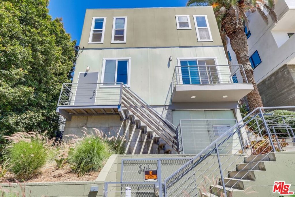 Architectural 1-bedroom, 1-bathroom townhouse-style apartment is located in the heart of Echo Park, just minutes from DTLA, Silver Lake, and more. This thoughtfully designed unit offers stylish LA living with bamboo floors throughout, central A/C and heat, and a sleek kitchen equipped with newer appliances. The open-concept main level features the kitchen and living areas. Upstairs, the spacious bedroom provides a peaceful retreat and natural light. Additional features include one off-street parking space for one vehicle and access to a community laundry room.