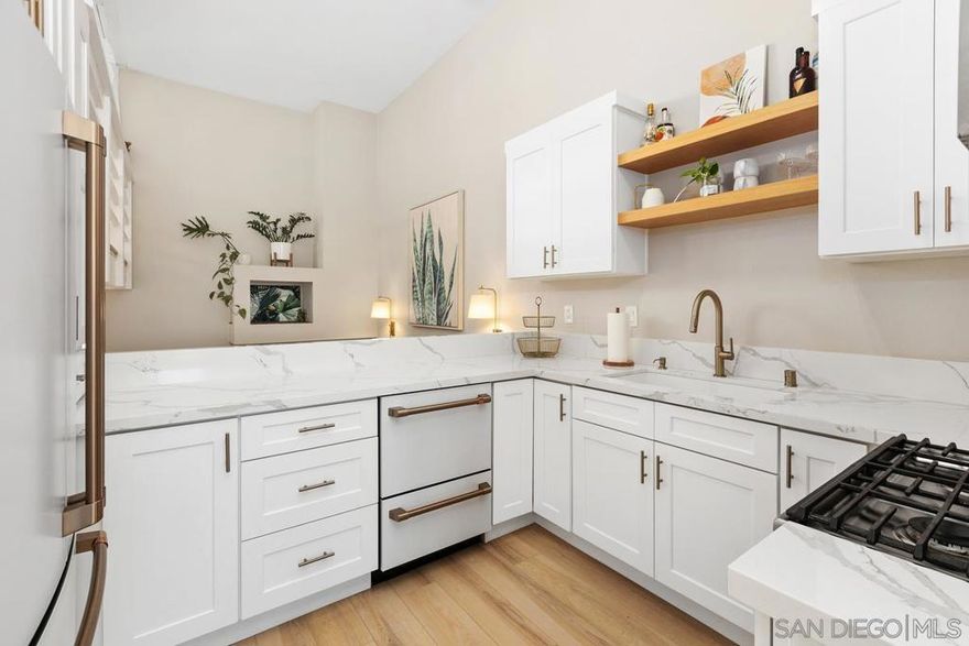 Experience life in one of San Diego’s most sought-after beach communities in this spacious Pacific Beach townhouse. Enjoy two bedrooms, each with an ensuite bathroom, large walk-in closet, and dedicated balcony. This property includes a bonus optional room, perfect for guest room or in-home office, and an additional large open loft area, making this two-bedroom property feel more like a four-bedroom home. Located in the perfect coastal location, within walking distance of Kate Sessions Park, beaches, grocery stores, bars, restaurants and so much more. Get your daily dose of San Diego sunshine with tons of private outdoor living space, including a large patio off the living room and four attached decks, providing an indoor/outdoor living flow to every floor of the townhome. Remodeled kitchen offers soaring ceilings, white custom cabinetry, quartz counters with Cafe' and Kitchen Aid appliances. Primary bath features a large custom walk-in shower and large dual sink vanity. Private two-car tandem garage with direct access, offering secure parking and extra storage space, with a newly upgraded quiet garage door opener. This multi-level property offers abundant natural light throughout with large and various windows, including two upgraded Anderson sliding glass doors. Enjoy central heating and A/C, with ecobee smart home thermostat, and cozy up on those cooler nights with two fireplaces. This property is located within a well-maintained gated complex of four privately owned townhomes, and is only attached on one side. This property truly has it all.