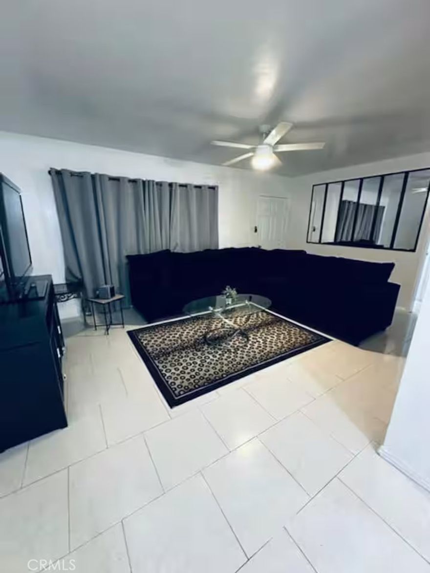 Enjoy comfortable living in this fully furnished and beautifully updated 2-bedroom, 1-bath home in a quiet Downey neighborhood. Located in a well-maintained duplex, only the second unit is currently available—perfect for individuals, couples, or small families.

Recently remodeled, the unit features tile flooring throughout and a functional, modern kitchen. It’s a clean, move-in-ready space that blends comfort and convenience.

Both bedrooms are furnished with queen-sized beds and high-quality all-cotton linens. A TV is located in the living room, and the linen closet is stocked with extra bedding, blankets, and towels. The bathroom includes a tub-shower combo.

The kitchen is fully equipped with a refrigerator, stove, microwave, and coffee maker. Additional amenities include high-speed internet, wall-mounted air conditioning, and an in-unit washer and dryer.

While garage access isn’t available, there is plenty of street parking. No pets or smoking allowed.