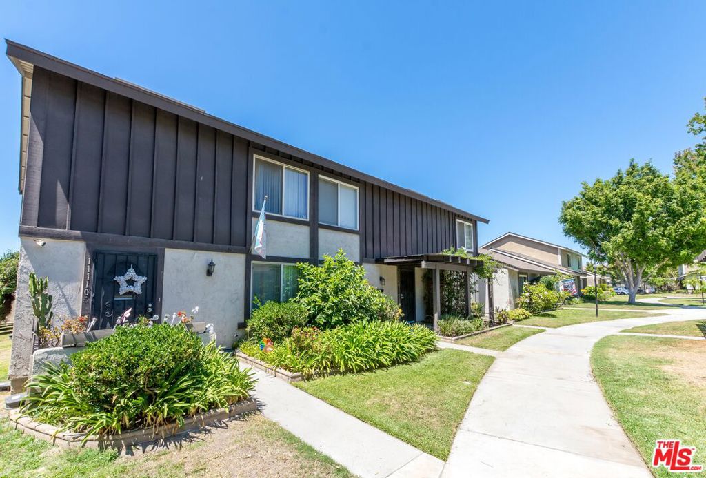 Well-maintained and upgraded townhome in the desirable Bradford Place community of Stanton. This 3-bedroom, 1.5-bath unit offers 1,121 sq. ft. of efficient living space with no wasted space. A private backyard connects directly to the two-car garage with laundry hookups, providing convenience and additional outdoor living space. The home features a powerful air conditioning system in the dining area. Bradford Place boasts landscaped grounds, mature trees, community pool, clubhouse, playground, etc. Located at the border of Stanton, Cypress, and West Garden Grove, the home is close to major shopping and dining (Target just one light away!). Although the address is Stanton, it falls within the award-winning Garden Grove Unified School District, serving Bell Intermediate and Pacifica High School. Priced below market (Check the comps!). We will let the market decide. This will not last long!