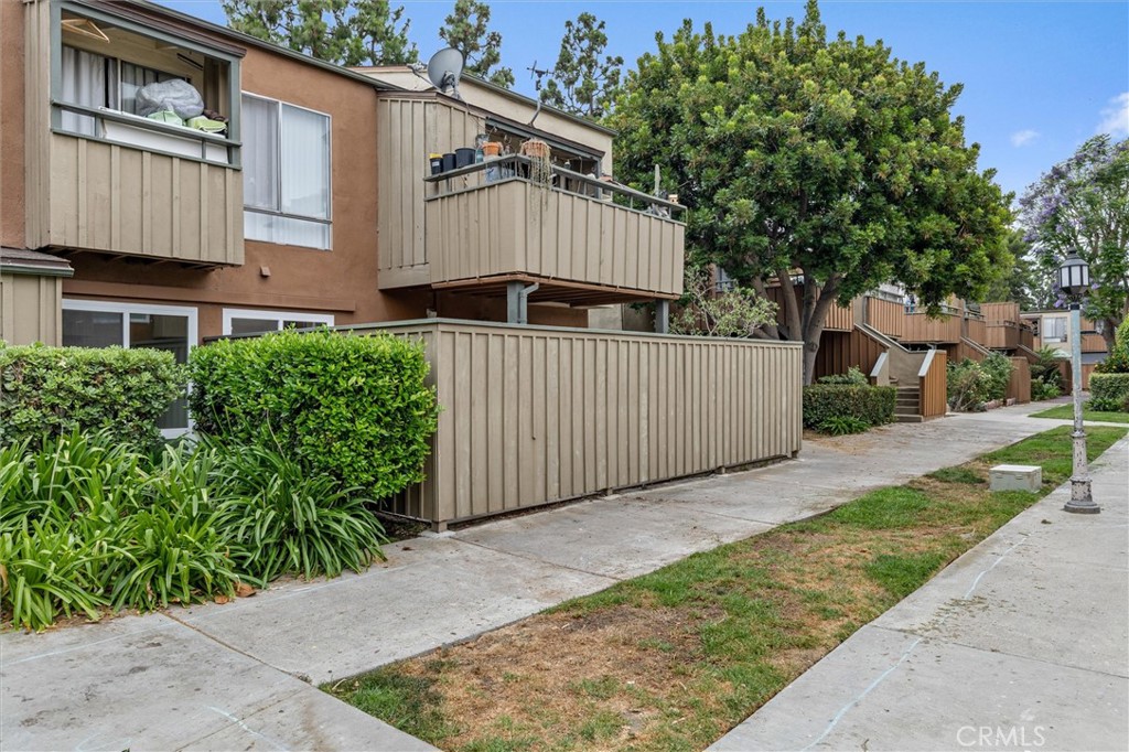 Welcome to 1001 W Stevens Ave Unit 319, a beautifully remodeled 2-bedroom, 1-bath condominium in the vibrant South Coast Metro area. Conveniently located just minutes from South Coast Plaza and the Avenue of the Arts, this ground-floor unit offers a bright open layout with fresh paint and wood flooring. The upgraded kitchen features sleek stainless steel appliances, perfect for cooking and entertaining. Enjoy the spacious, fenced-in private patio for indoor-outdoor living, as well as an upgraded bathroom with dual sinks. This home includes upgraded windows, and sliding door, and upgraded air conditioning for year-round comfort. Residents of the gated community can take advantage of amenities such as a swimming pool, spa, clubhouse, and community laundry facilities.