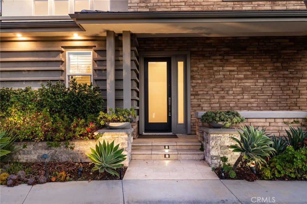 Photo of 66 Bolide, Irvine, CA 92618 (MLS # OC26223762)