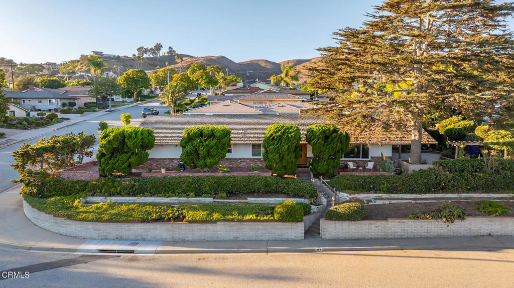 Perched in the desirable Foothill Estates, this spacious four-bedroom, two-bathroom home offers sweeping ocean views and breathtaking panoramas of the Channel Islands. On the market for the very first time, this property presents a rare opportunity to own a home in one of Ventura's most sought-after neighborhoods.Step inside and be greeted by high ceilings, abundant natural light, and updated windows that frame the views beautifully. Shutters throughout the home add charm and privacy, while the recently updated heating system provides comfort and peace of mind.The living areas flow seamlessly to the outdoors with a large sliding glass door that opens to the serene backyard, where you'll find a peaceful pond, lush landscaping, and multiple areas for entertaining or simply enjoying the coastal breeze. Red-tailed hawks are often seen soaring above, adding to the natural beauty and sense of tranquility this property provides.Conveniently located near Loma Vista Elementary, with a pathway leading directly to the school, this home also offers close proximity to shopping, fine dining, and scenic hiking trails, providing the perfect blend of comfort, convenience, and lifestyle. With lots of storage, thoughtful details, and timeless design, it is both practical and inviting.The combination of expansive ocean vistas, prime Foothill Estates location, and first-time availability makes 364 Shamrock Drive a truly special offering. Don't miss the chance to experience the unmatched beauty of everyday sunsets over the Pacific and the Channel Islands right from the comfort of your own home.