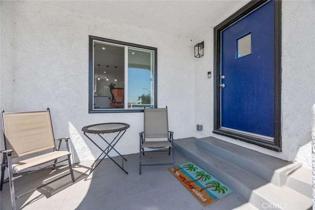 Photo of 7037 Cimarron Street, Los Angeles, CA 90047 (MLS # DW26005307)