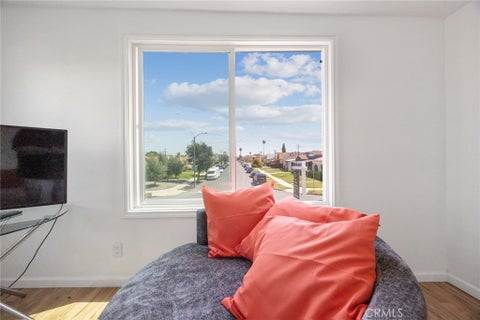 Photo of 7037 Cimarron Street, Los Angeles, CA 90047 (MLS # DW26005307)