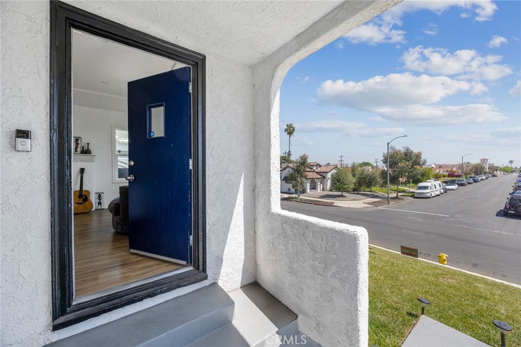 Photo of 7037 Cimarron Street, Los Angeles, CA 90047 (MLS # DW26005307)