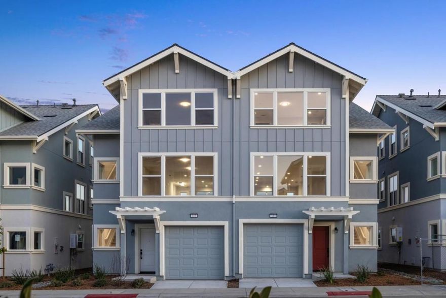 Hillcrest Residences' sales office is located at 511 Ohlone Pkwy Watsonville, CA 95076.  This upgraded 3-bedroom, 3.5-bath townhome offers 2,048 sq. ft. of thoughtfully designed living across three levels. The Encanto floor plan includes ensuite bedrooms on each floor, a half bath, and multiple spaces for both relaxation and productivity. Designer upgrades and a white and gray color palette give the home a clean, modern aesthetic from countertops to flooring. The entry-level features a private ensuite bedroom and a tandem 2-car garage with storage. On the main level, the open-concept kitchen is equipped with Whirlpool appliances and a large pantry, connecting seamlessly to the dining and great rooms. A built-in alcove adds flexibility for a home office, and the living room opens to a private balcony. Upstairs, the primary suite includes a walk-in closet, bathroom with double sinks, and a stand-alone shower. The third ensuite bedroom sits adjacent to the laundry room, providing privacy and functionality. Additional features include luxury plank flooring and CAT-5 hardwired internet for enhanced connectivity. Community amenities will include walking and biking trails, a sports court, fitness par course, bocce ball court, BBQ areas, picnic tables, and a children's play area.